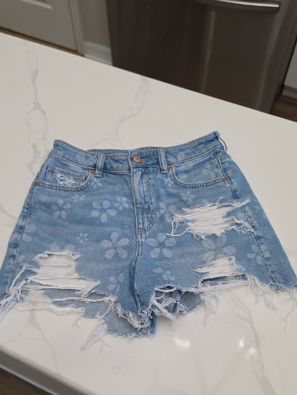 American Eagle High-Rise Light Blue Distressed Floral Denim Shorts